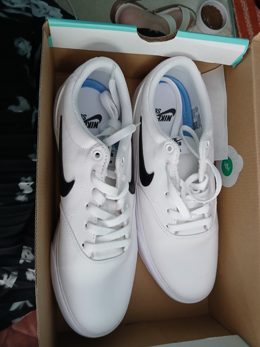 Nike White Sneakers with Black Swoosh